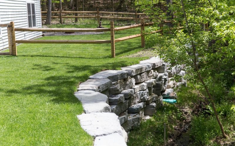 Retaining wall expands yard space in New Paltz, NY by Masseo Landscape, New Paltz Landscaper