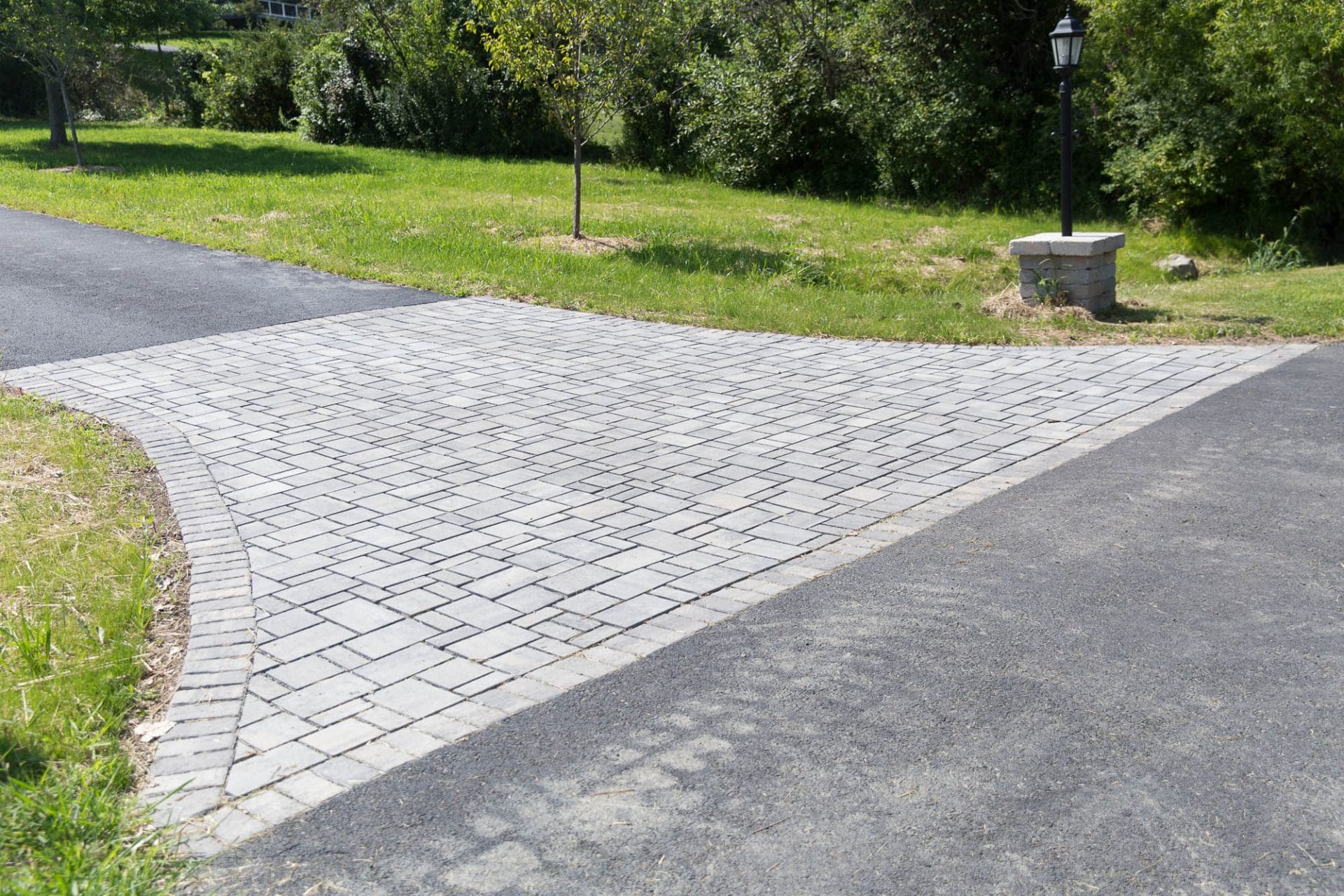 A geometric precast concrete Belgard driveway in New Paltz