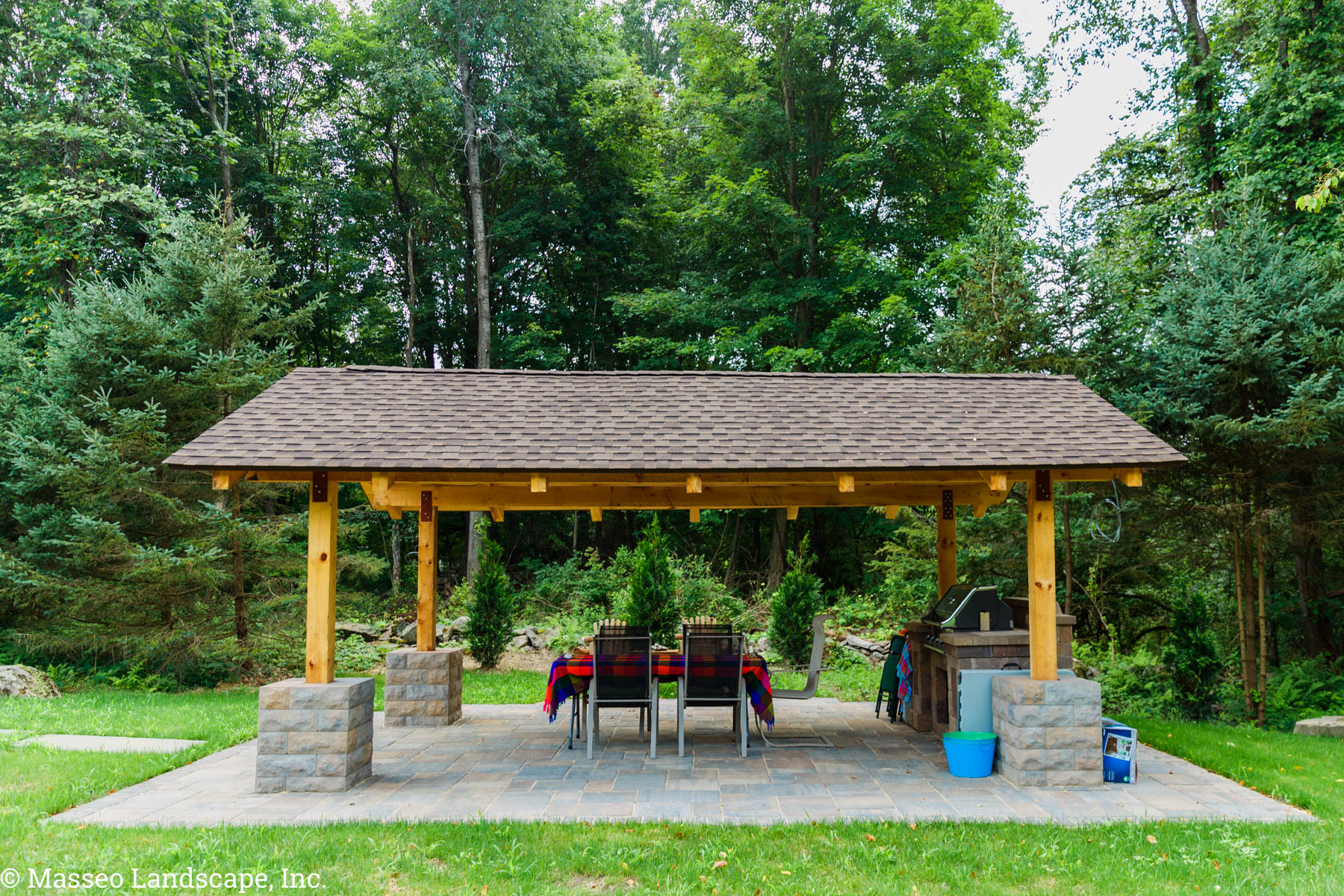 Belgard patio and custom built wooden pavilion built by Masseo Landscape, Inc., landscape contractors in Highland, NY.