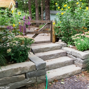 Rosetta Kodah retaining walls and steps in an entryway in New Paltz, NY by Masseo Landscape, Inc.